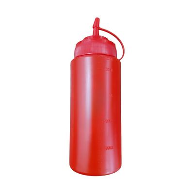 Red plastic squeeze sauce bottle