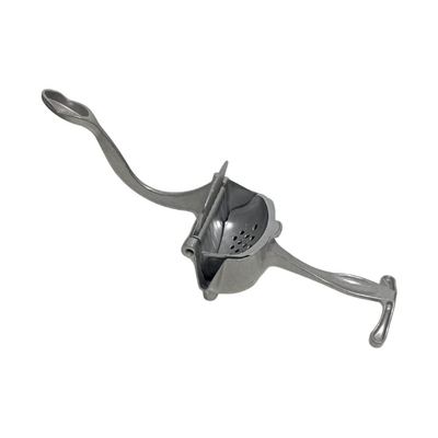 Cast metal hand lemon squeezer