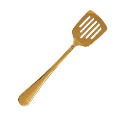 Gold slotted serving turner