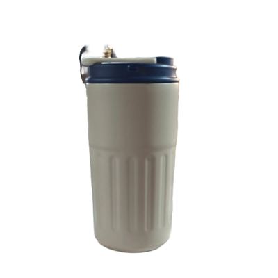 Insulated coffee tumbler with temperature display