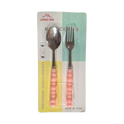 Spoon and fork set with pink handles