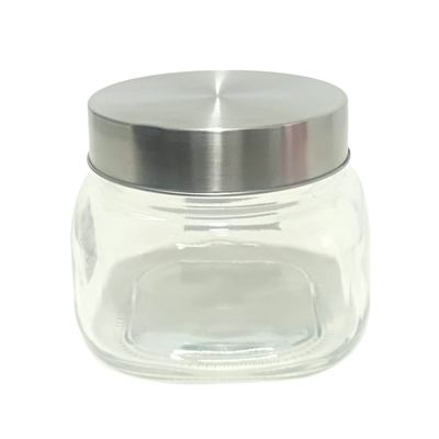 Small glass storage jar with steel lid